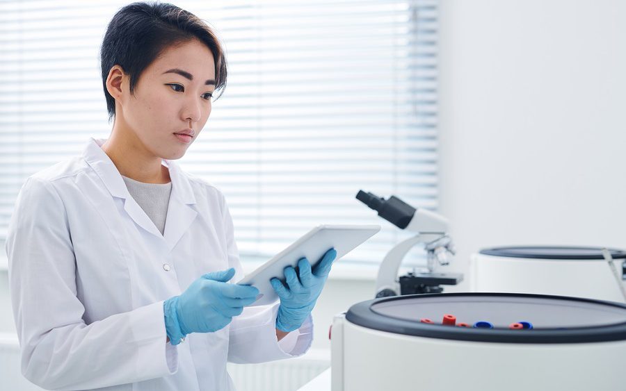 Researcher carrying out internal lab audit